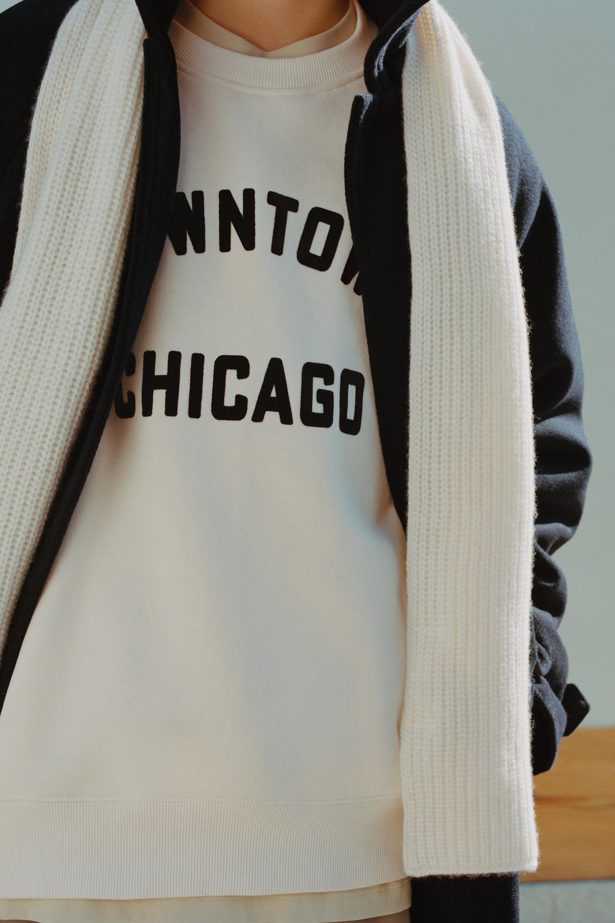 FLOCKED TEXT SWEATSHIRT